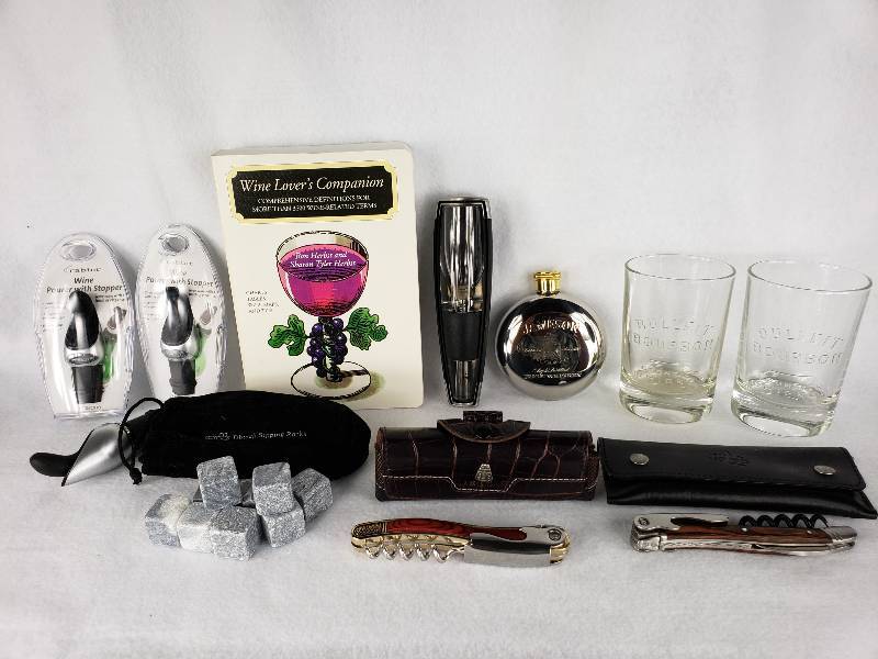 lot 117 image: Bulleit Burbon Glasses, Wine Stoppers, Laguiole Wine Screws, Wine Book, etc.
