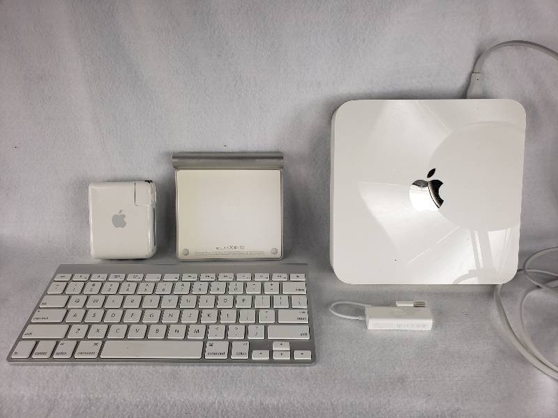 lot 142 image: Apple Products Time Capsule 2TB, AirPort Express, Keyboards, etc.
