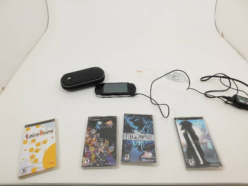 lot 68 image: PSP Game With AC Adapter