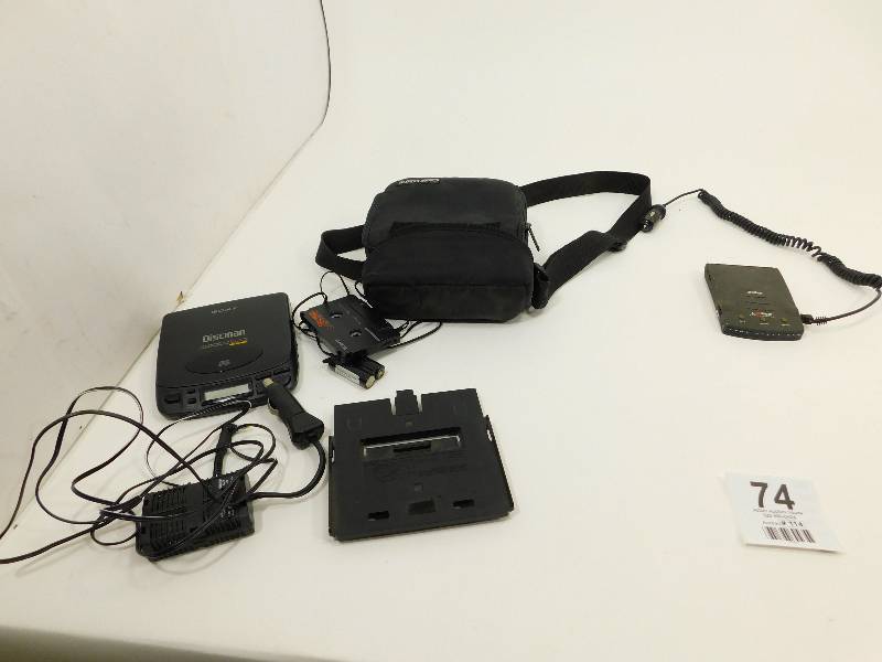 lot 74 image: Sony Discman CD Compact Player With Case & Adapters---A Uniden Laser Superwideban Stalker