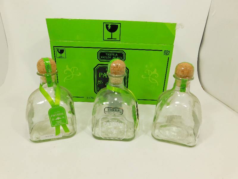 lot 118 image: Three 100% Silver Patron Tequila Bottles