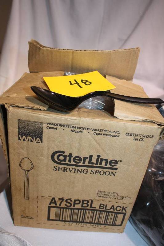 Three open bags of Black Serving Spoons A7SPBL