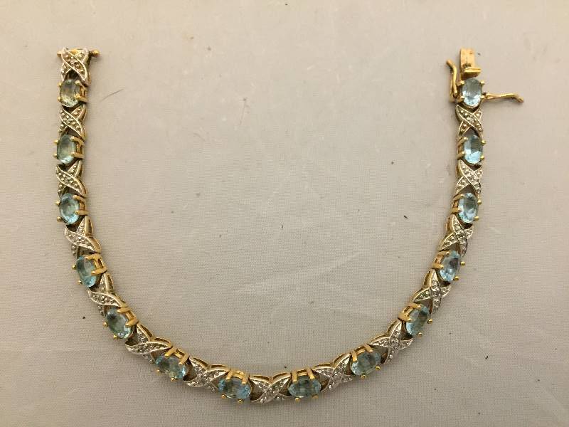 lot 353 image: Sterling Silver Topaz Bracelet