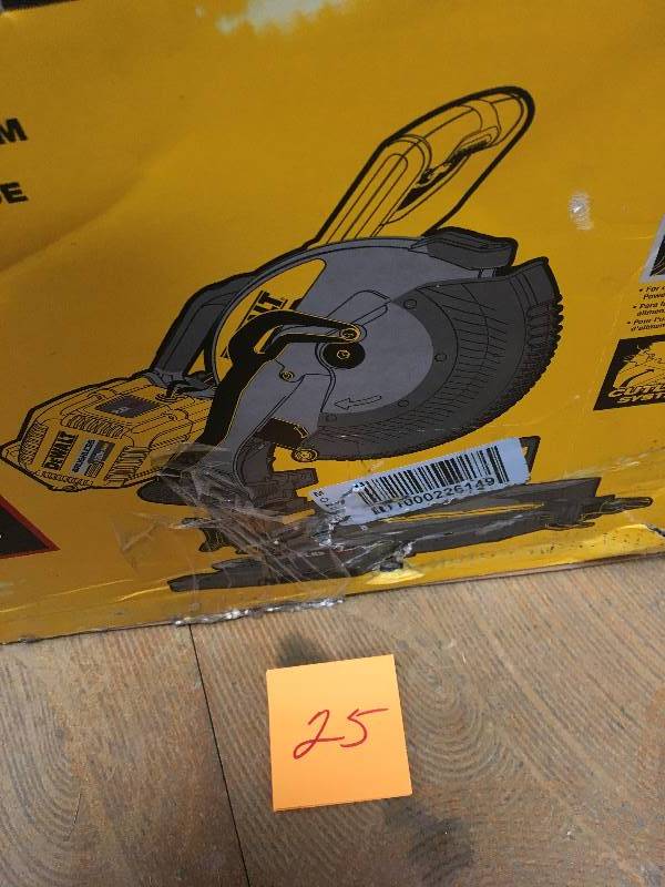 lot 25 image: DeWalt FLEXVOLT 120-Volt MAX Lithium-Ion Cordless Brushless 12 in. Miter Saw w AC Adapter not used