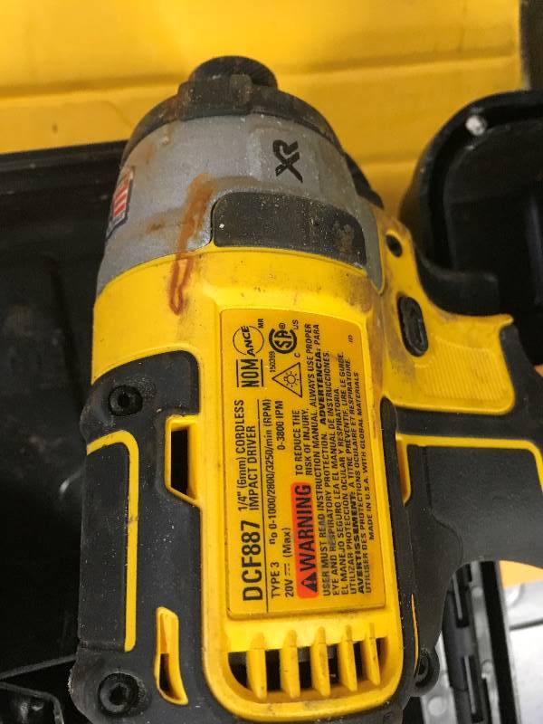 lot 29 image: DeWalt 20-Volt MAX XR Lithium-Ion Cordless Brushless 14 in. 3-Speed Impact Driver 1 battery and charger included in very good working condition