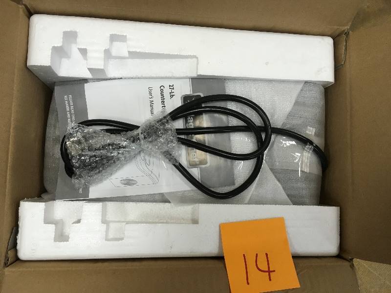 lot 14 image: Magic Chef HMIM27BST 27lb Portable Countertop Ice Maker  Black Stainless Not Used
