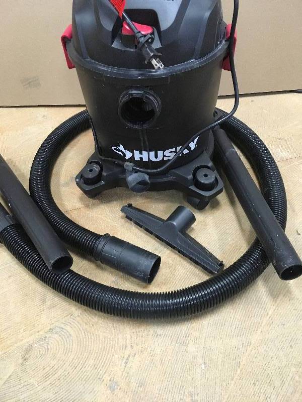 lot 57 image: HUSKY 4 Gal. Portable Poly WetDry Vacuum Used like new