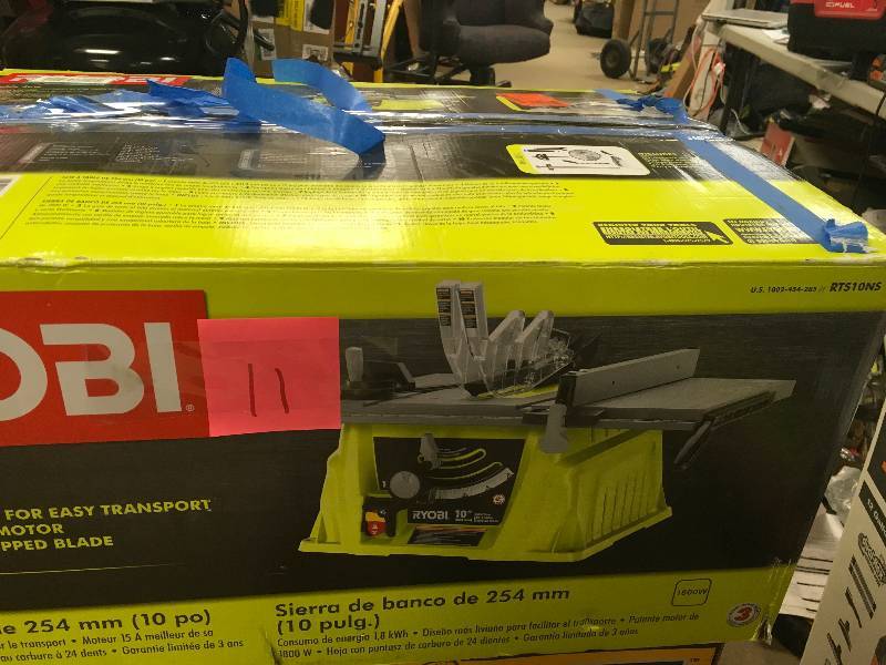 lot 11 image: RYOBI 10 in. 15 Amp Table Saw in good working conditions