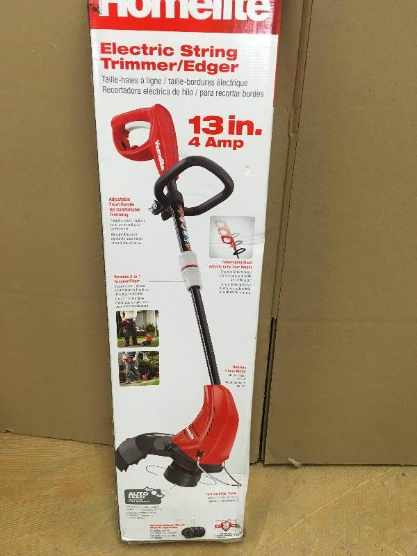 lot 21 image: Set of 2 Homelite 13 in. 4 Amp Straight Electric String Trimmer in working conditions