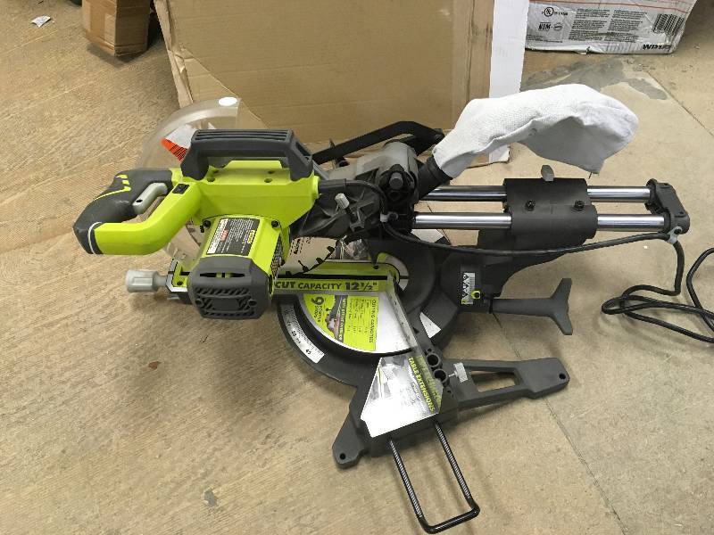 lot 4 image: RYOBI 15-Amp 10 in. Sliding Miter Saw with Laser Open Box No Blade In very good condition