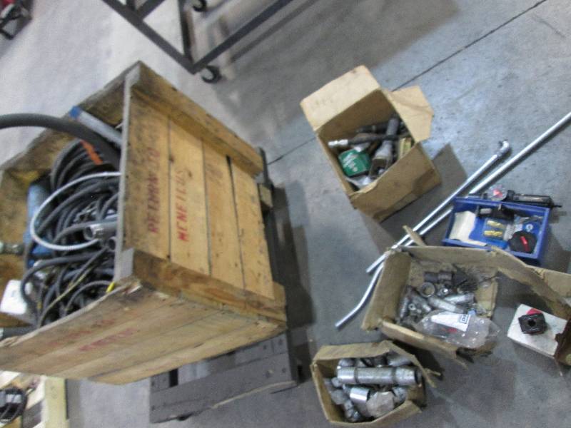 lot 82 image: Wood crate filled with hoses, valve...