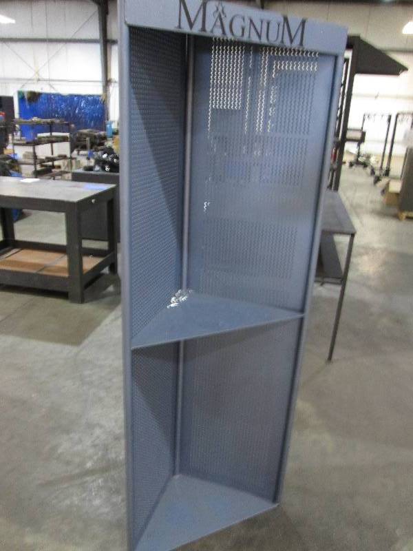 lot 71 image: Metal corner shelf, sides measure 1...