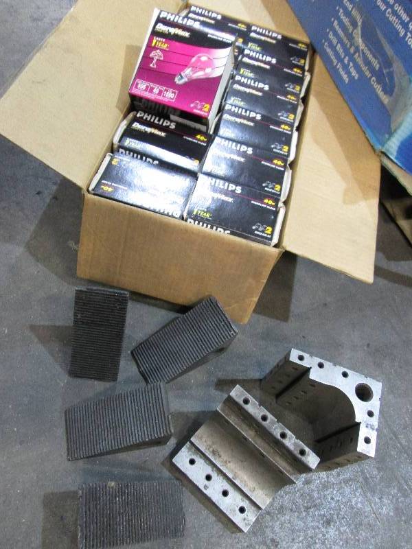 lot 78 image: New 40 watt light bulbs and tooling...