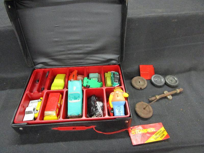 lot 95 image: Car case and Old Plastic Cars and Simpson Toy