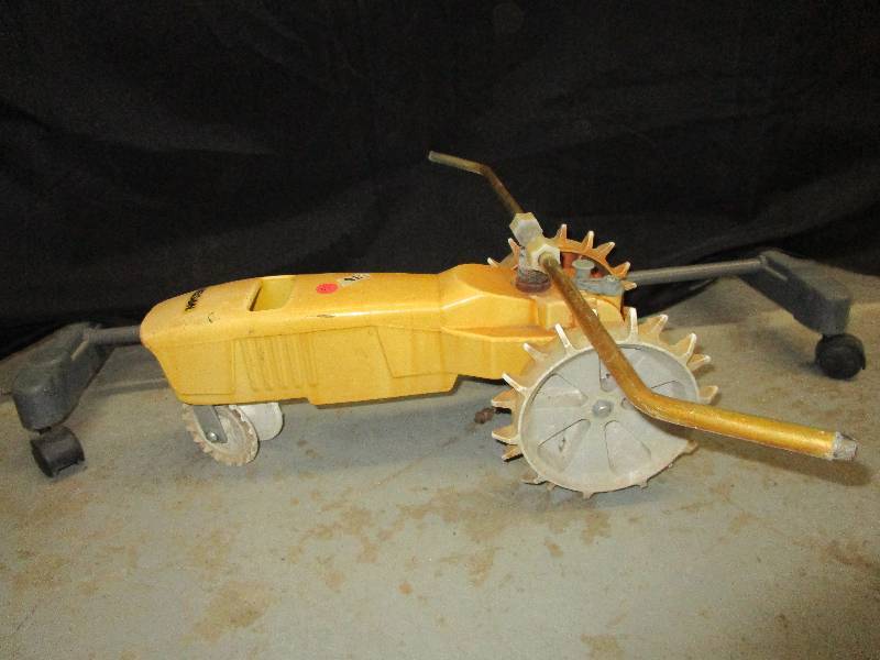 lot 128 image: Tractor Sprinkler