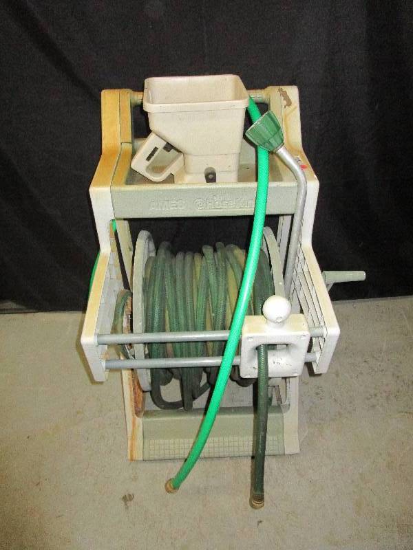 lot 132 image: Garden Hose and Reel