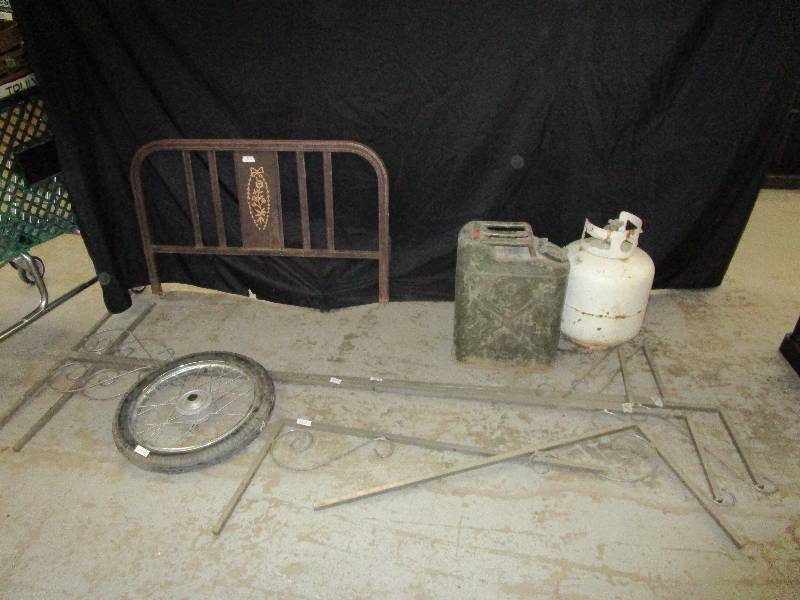 lot 153 image: Metal Bracketds, Decorative Wheel, Propane Tank, Od Gas Can and Head Board