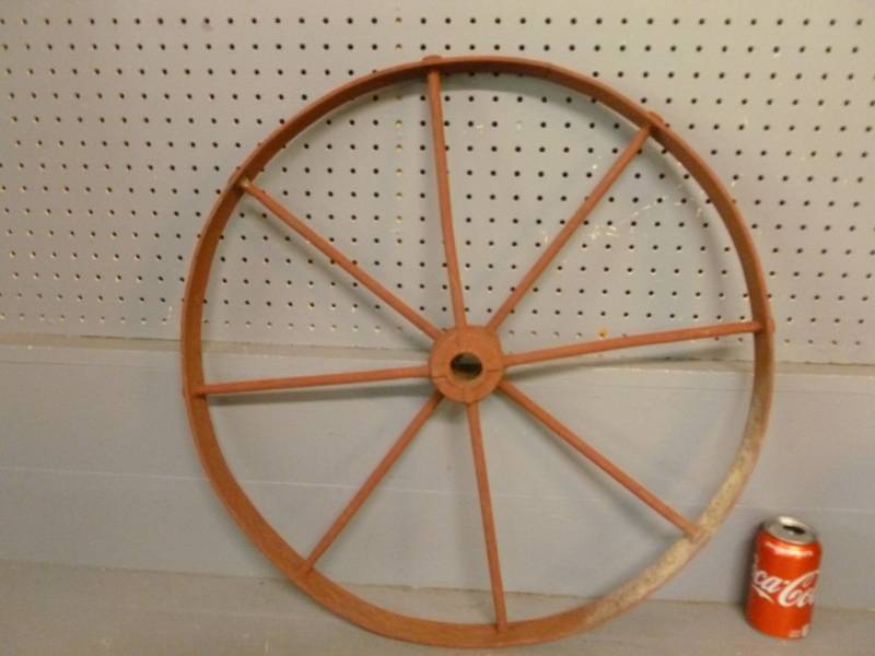 lot 104 image: Vintage Steel Wheel