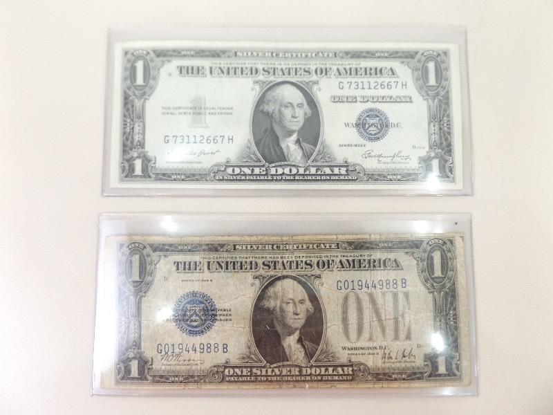 lot 33 image: 1928-B U.S. Funny Back, and 1935-E U.S. One Dollar Silver Certificates