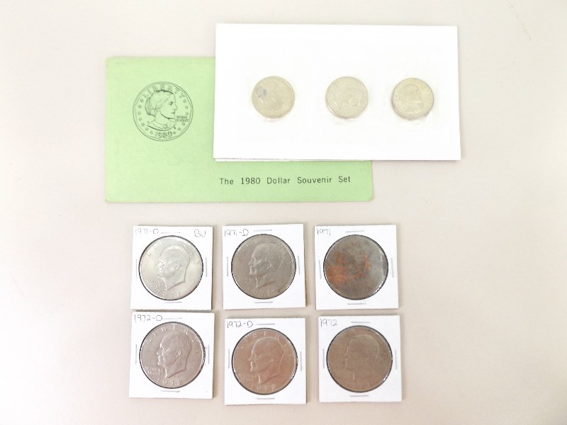 lot 34 image: 1980 Susan B. Anthony Dollar Souvenir Set, and 6 - 1971-1972 Eisenhower Dollars