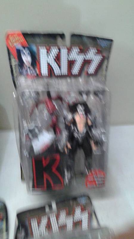 lot 36 image: Lot Of Four Mcfarlane KISS Dolls, All Members, Unused, But Packages Show Wear
