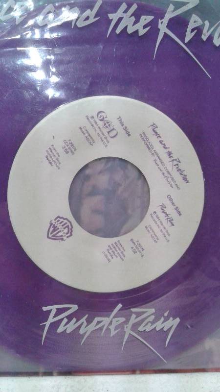 lot 100 image: 7 Prince Purple Rain Single Vinyl Record