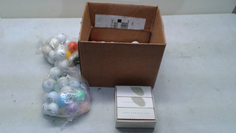 lot 94 image: Box With Used Golf Balls, A Few New Ones