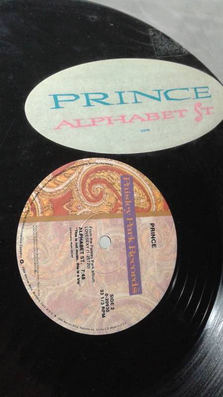 lot 114 image: 12 Prince Vinyl LP Record Cover May Show Wear, Record In Good Condition - Alphabet St