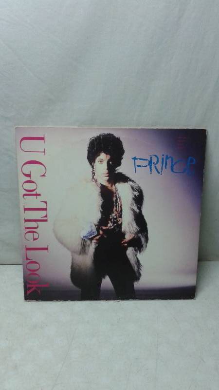 lot 115 image: 12 Prince Vinyl LP Record Cover May Show Wear, Record In Good Condition - U Got The Look