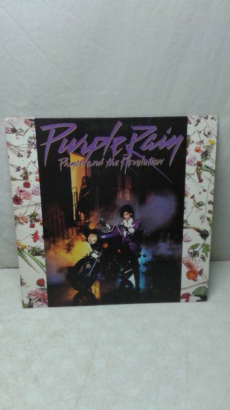 lot 118 image: 12 Prince Vinyl LP Record Cover May Show Wear, Record In Good Condition - Purple Rain