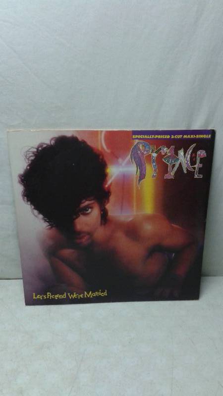 lot 119 image: 12 Prince Vinyl LP Record Cover May Show Wear, Record In Good Condition - Lets Pretend Were Married