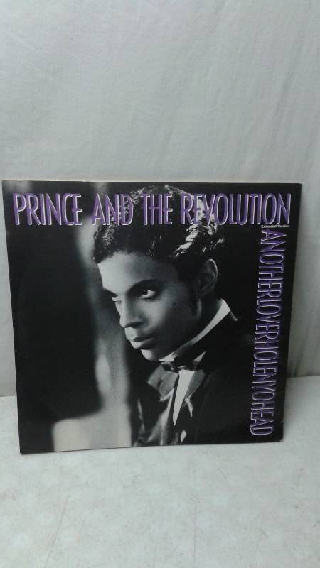 lot 122 image: 12 Prince Vinyl LP Record Cover May Show Wear, Record In Good Condition - AnotherloverholeNyourhead