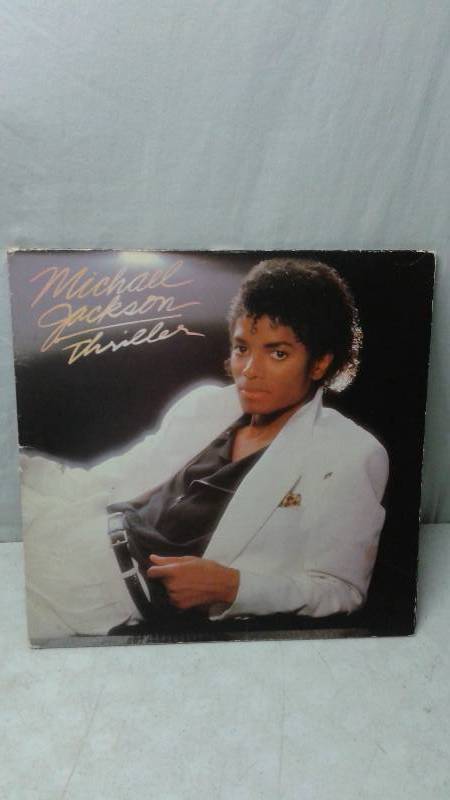 lot 126 image: 12 Vinyl LP Record, Cover May Show Wear, Record In Good Condition - Michael Jackson Thriller