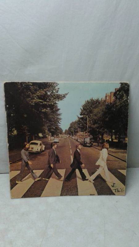 lot 129 image: 12 Vinyl LP Record, Cover May Show Wear, Some Wear To Record - Beatles Abby Road