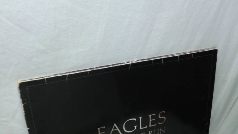 lot 132 image: 12 Vinyl LP Record, Cover May Show Wear, Record In Good Condition - Eagles The Long Run
