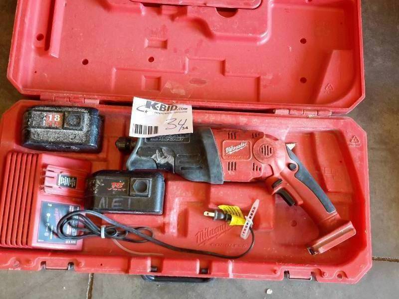 lot 34 image: Milwaukee, 18 V cordless Sawzall, with Charger and Extra Battery and Case