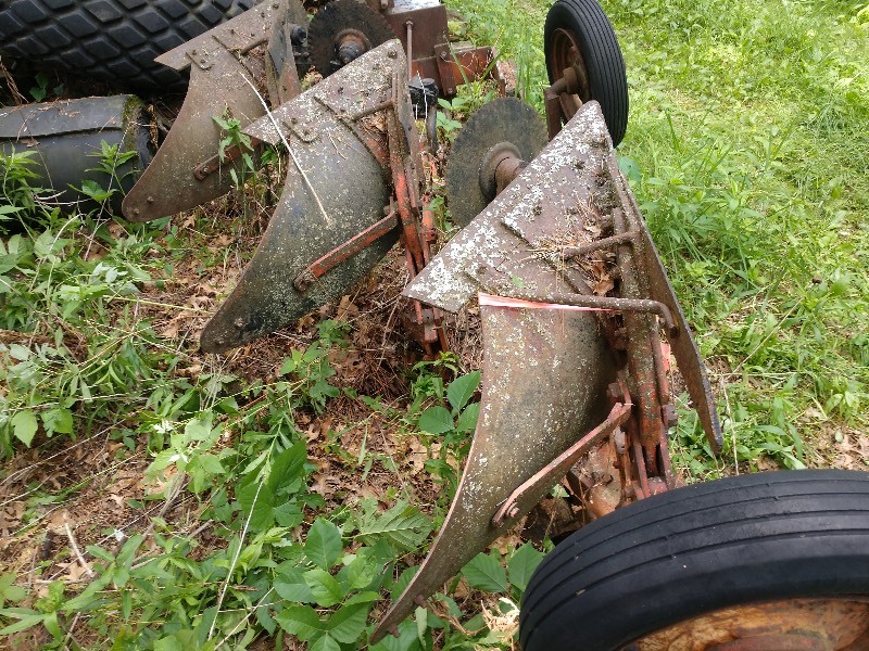 Orange J.I. Case Co. Three Row Plow