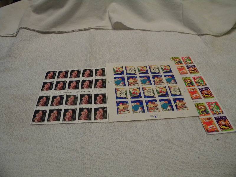 Sheets of unused Postage Stamps