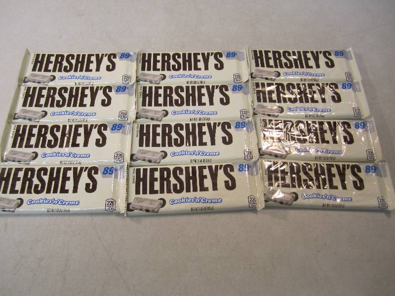 lot 63 image: 12 Hersheys Cookie n Creme Candy Ba...