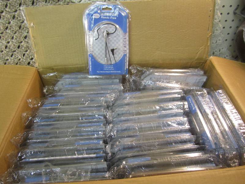 lot 89 image: Case of 100 Universal Handsfree Ear...