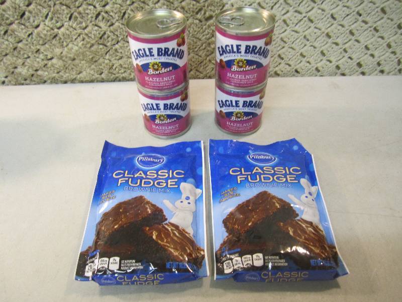 lot 212 image: Mix Lot of 4 Cans Hazelnut Condense...