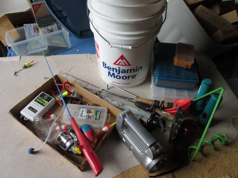 Lot of fishing gear and flashlights...