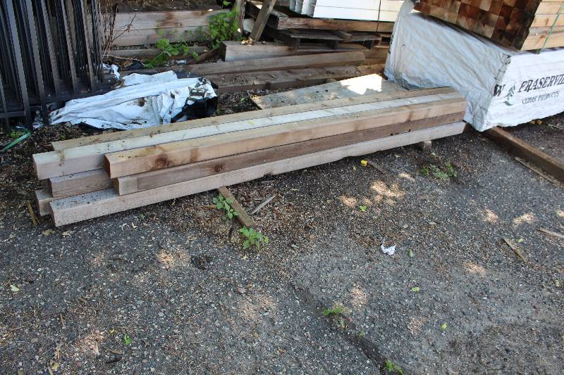lot 14 image: Lot of (9) 4x4 red cedar posts