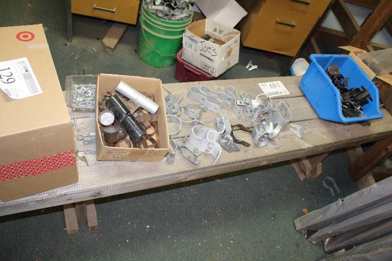 lot 129 image: Fence Hardware - Straps, Caps, Chain Link Adapters, And More