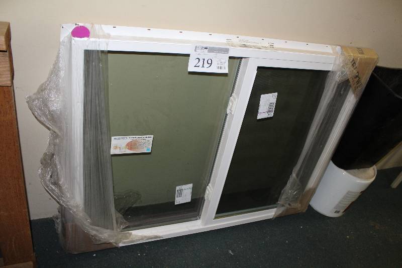 lot 219 image: Builders Standard Nail Finish Vinyl Half Slide Window w Frame