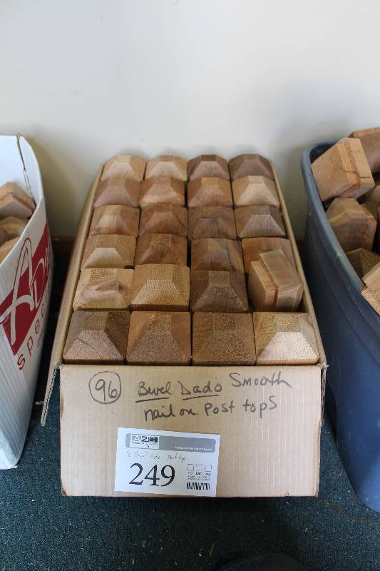 lot 249 image: Lot of (96) Bevel Dado Smooth Nail-On Wood Fence Post Tops