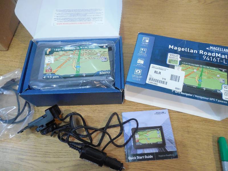 lot 64 image: Magellan RoadMate 7 Touch Screen GPS Navigator with FREE Lifetime Map Updates and Traffic Alerts