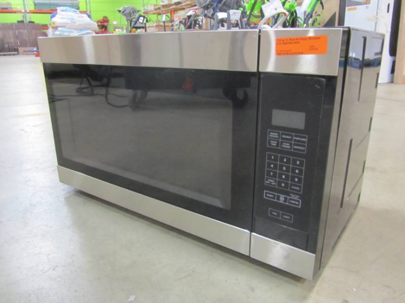 lot 22 image: AMANA 1.6 CU FT OVER THE RANGE MICROWAVE IN STAINLESS STEEL