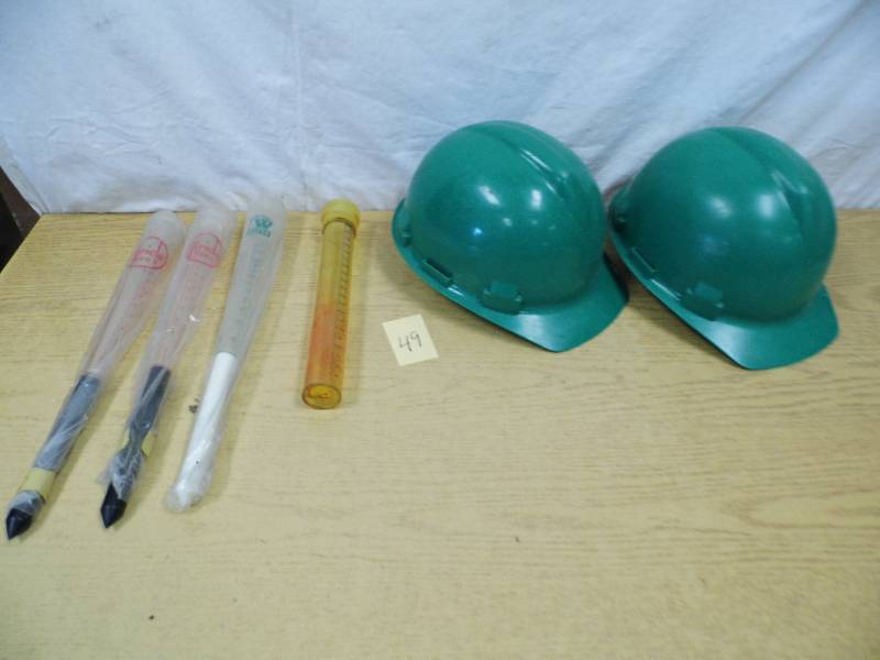 lot 49 image: Rain  Guages - Hard Hats
