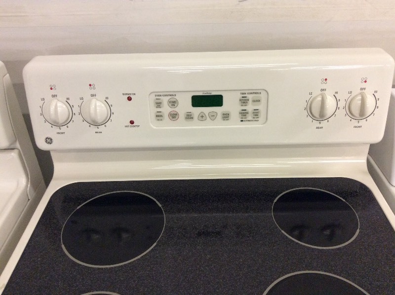 lot 3 image: GE Bisque Glass Top Stove